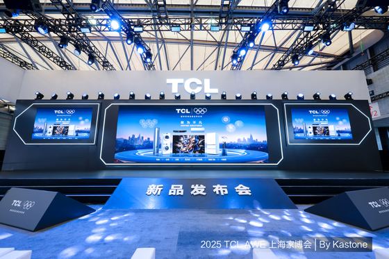 TCL; TCL | Olympic rings lockup (on three LED screens and both podium blocks) booth — 2025 TCL AWE 上海家博会 (watermark); 新品发布会 (stage floor letters); ctx: 2025 AWE TCL展台 上海